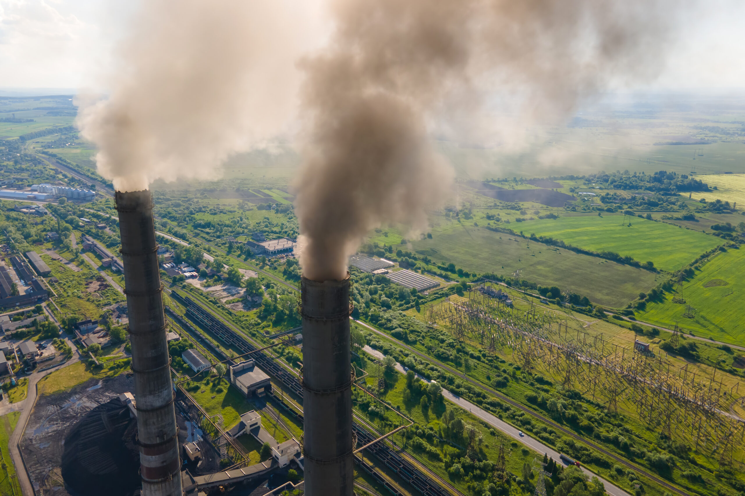 Image of fields and polluting agents that effect allergies and asthma.